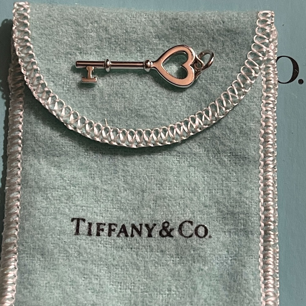 Tiffany & Co. Sterling Silver Heart Key Pendant.